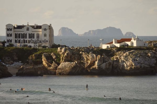 The Baleal coast with surfers riding the waves - Surf Stories